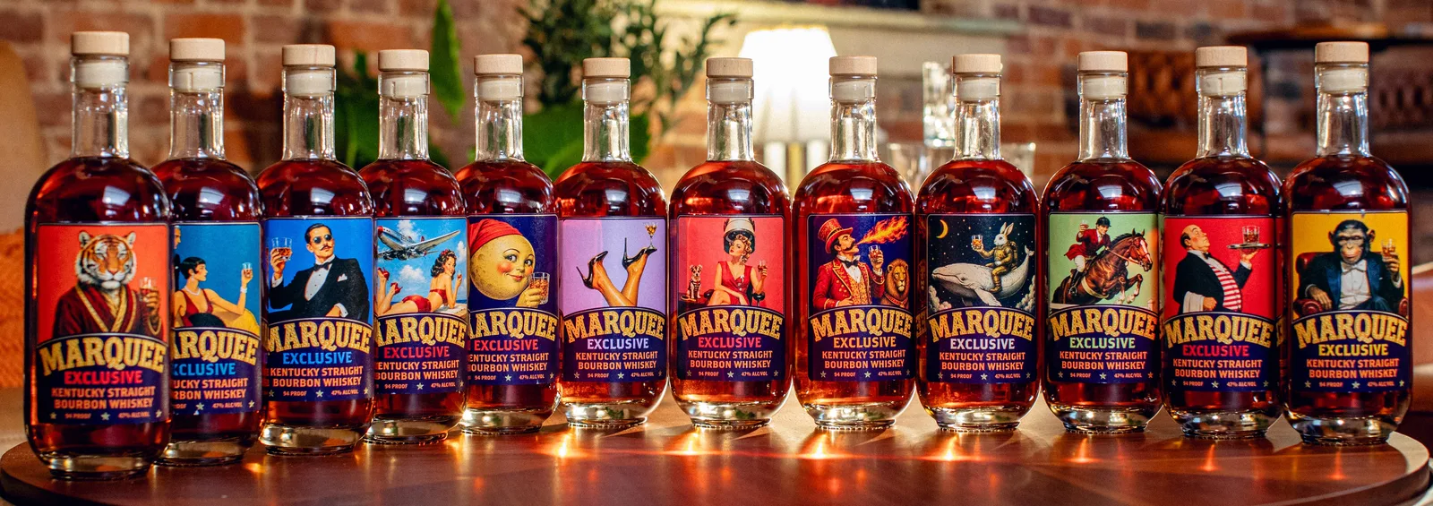 All twelve Marquee Exclusive Batch #1 bottles in a row on a bar table, each with a different label